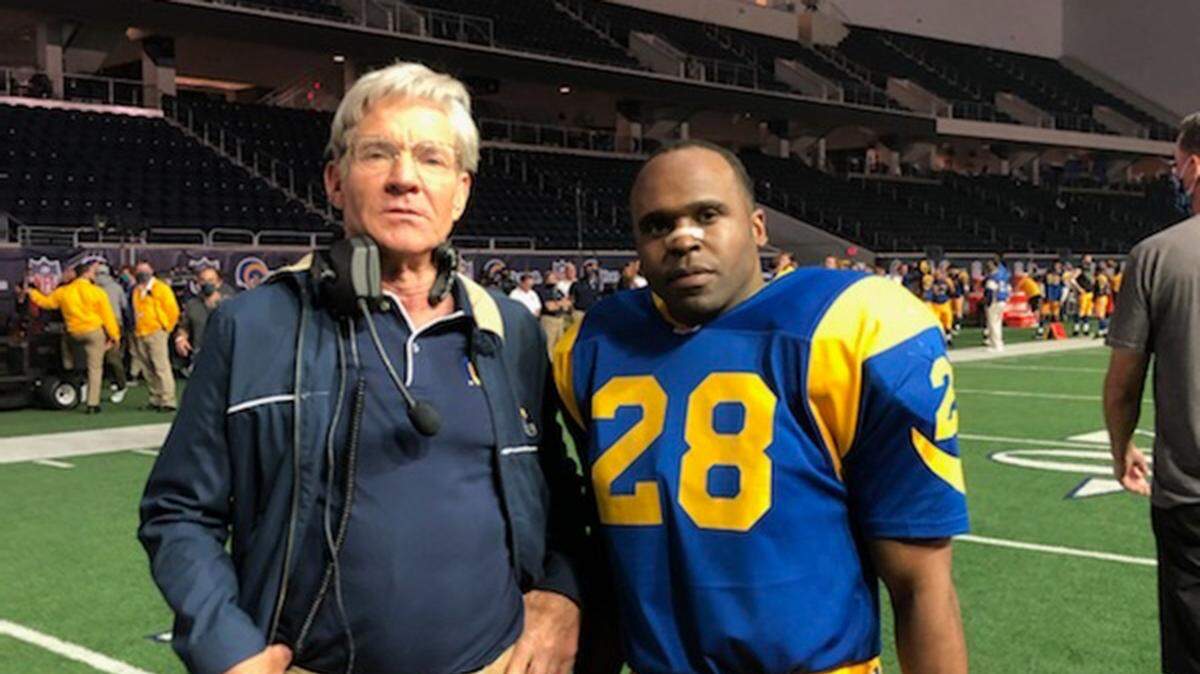 O.J. Keith Simpson of Kansas City, right, plays Marshall Faulk in the movie “American Underdog.” Dennis Quaid plays Dirk Vermeil, who coached the Chiefs from 2001 to 2008.