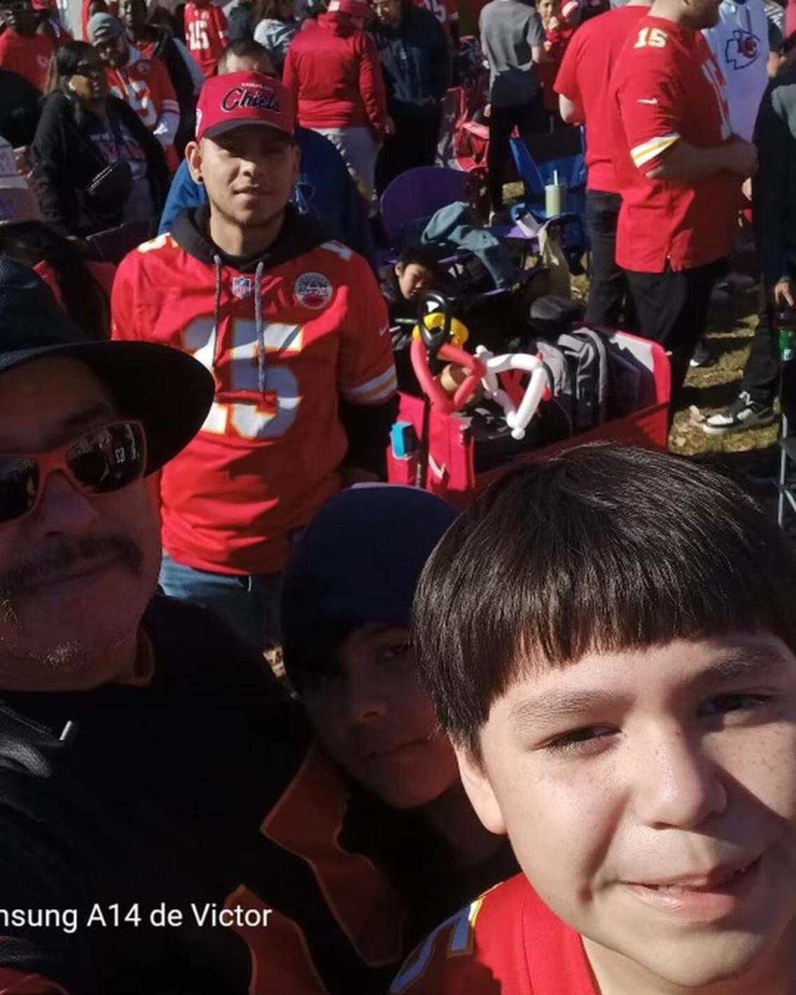 Samuel Arellano and his grandfather, Victor Salas Sr., at the Kansas City Chiefs Super Bowl celebration at Union Station before the boy was struck by a bullet.