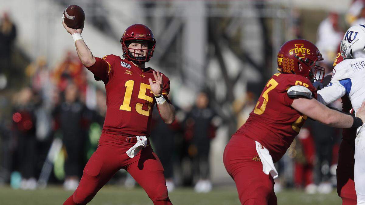 Iowa State quarterback Brock Purdy drops back to pass during the first half of an NCAA college football game against Kansas, Saturday, Nov. 23, 2019, in Ames, Iowa. (AP Photo/Matthew Putney)