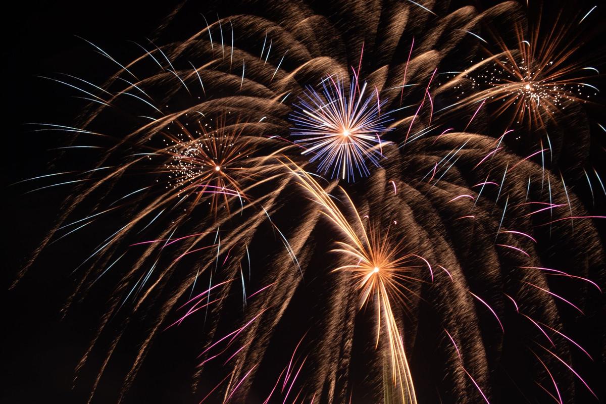 Fireworks burst over the tower at the National WWI Museum Thursday in Kansas City.