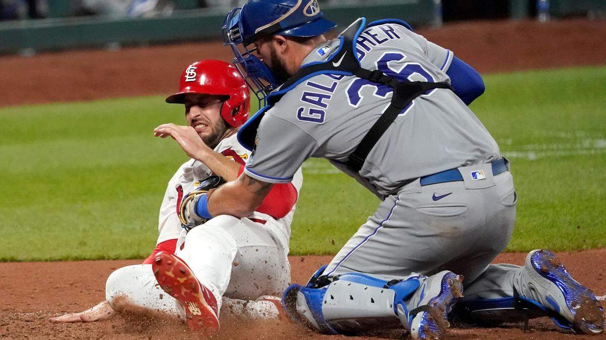 St. Louis Cardinals’ Paul DeJong is tagged out at home by Kansas City Royals catcher Cam Gallagher (36) during the eighth inning of a baseball game Tuesday, Aug. 25, 2020, in St. Louis. (AP Photo/Jeff Roberson)