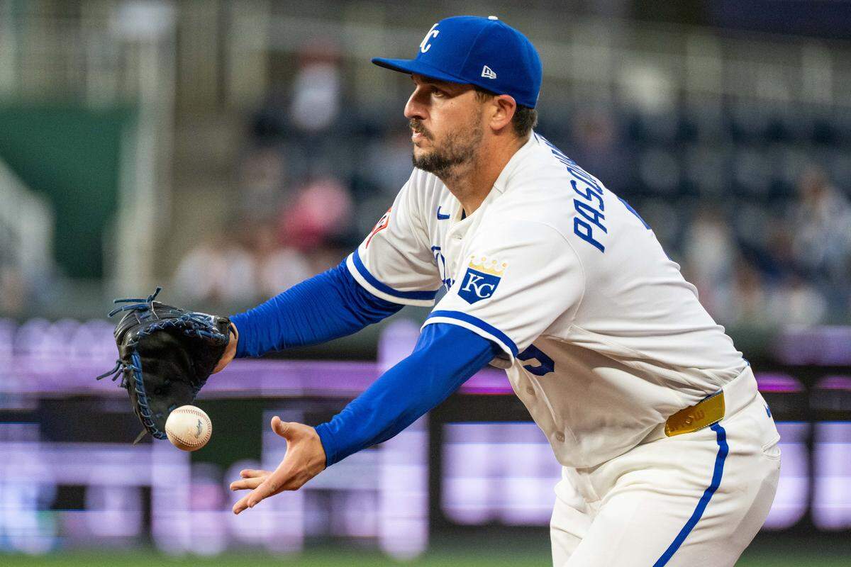 Kansas City Royals first baseman Vinnie Pasquantino (9) tosses the ball to the pitcher for an out during a game against the Boston Red Sox on Tuesday, May 19, 2026, at Kauffman Stadium.