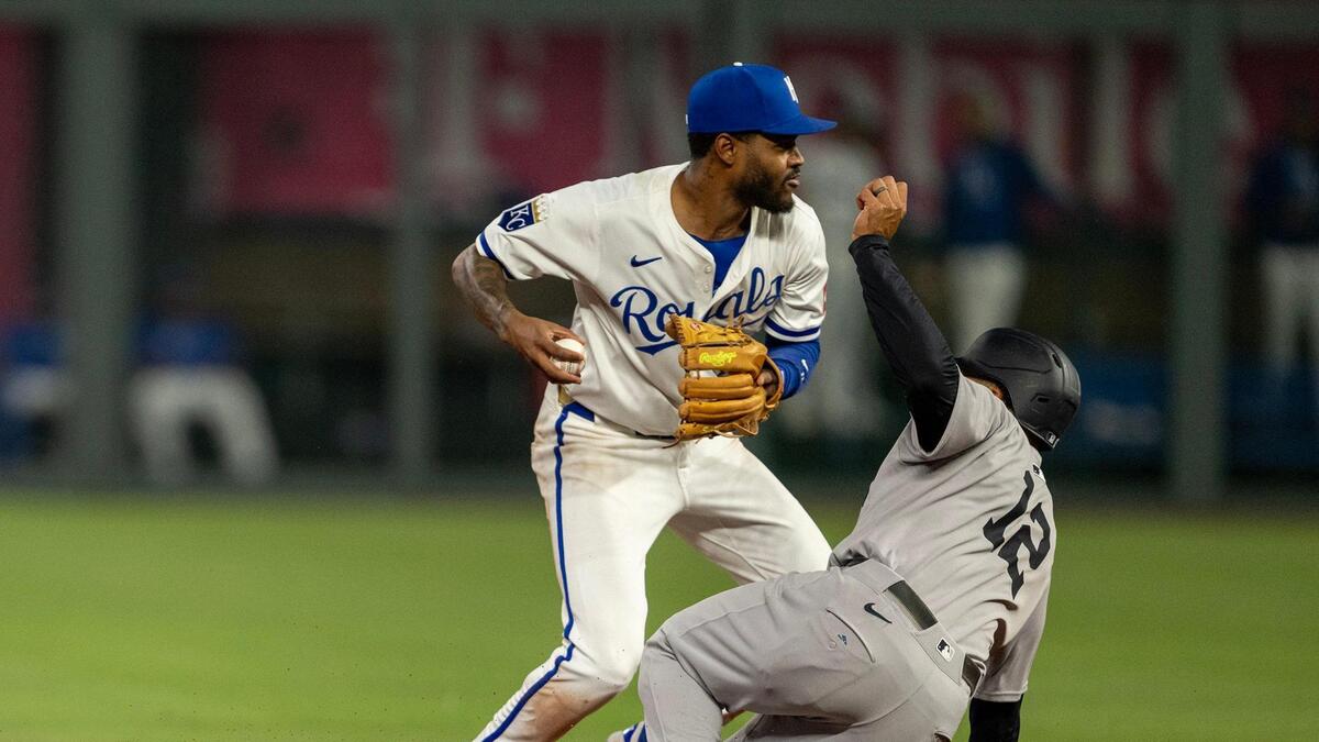 Kansas City Royals third baseman Maikel Garcia (11) tags the bag for an out at second as New York Yankees outfielder Trent Grisham (12) slides on Tuesday, June 10, 2025, at Kauffman Stadium in Kansas City.