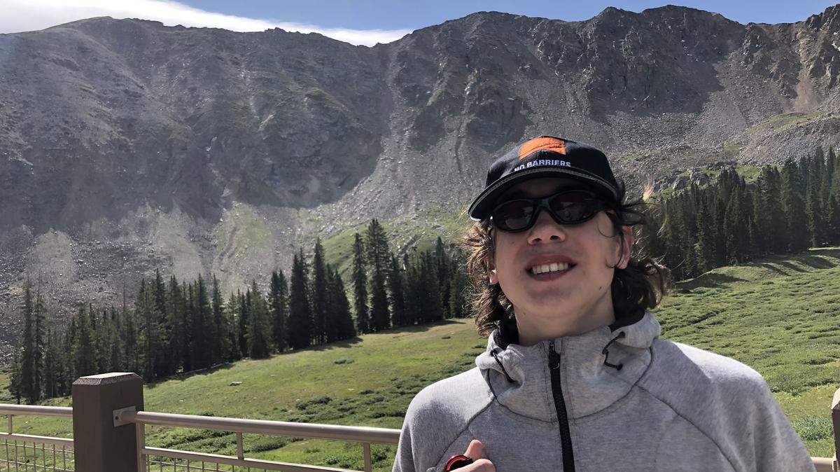 Lee’s Summit North High School freshman Isaac McBurney hiked a Colorado mountain with his hero, Erik Weihenmayer, the first blind person to reach the summit of Mount Everest.