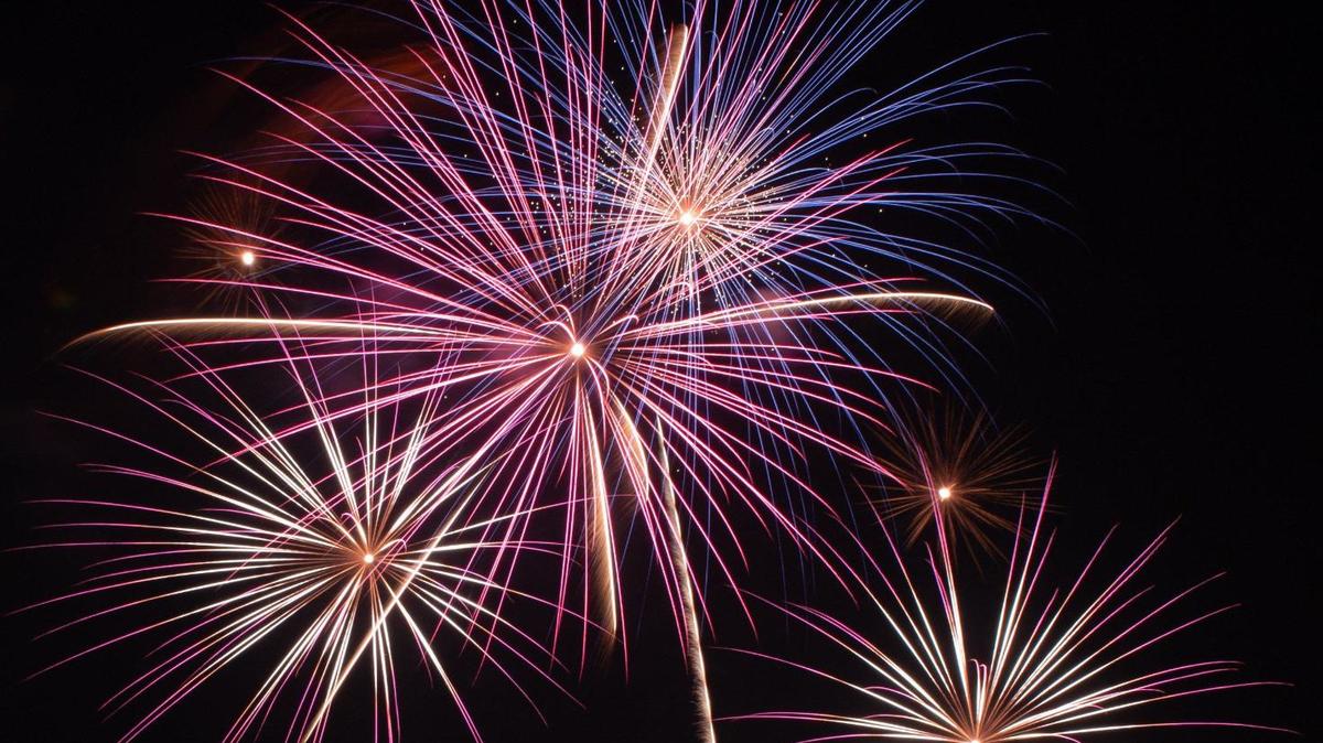 Fireworks burst over the Liberty Memorial on July 4, 2024, in Kansas City.