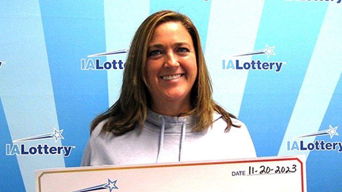 An Iowa woman won a big prize on a $2 crossword scratch off ticket after she spoke it into existence.