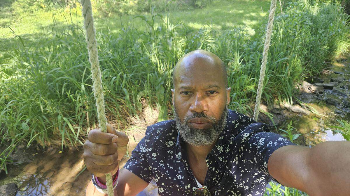 Toriano Porter tried out a swing he found on his walk.