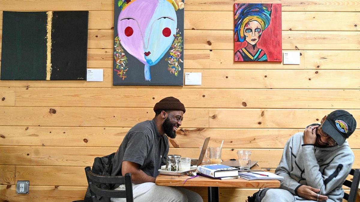 Muenfua Lewis (left) and Jeremy Yon at Rochester Brewing and Roasting Company, Feb, 15, 2022. The Crossroads eatery is one of the additions to Kansas City since the Chiefs started their AFC championship streak in 2019.