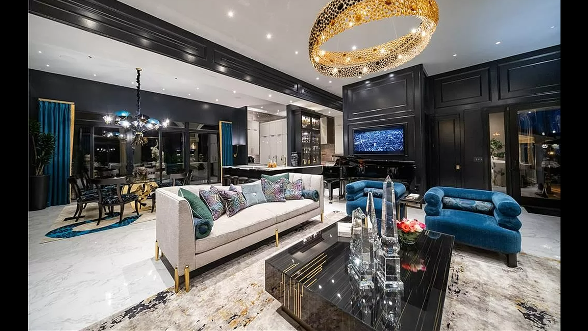 A peek inside the condo at 4 E. 51st St. in Kansas City reveals one of many custom chandeliers hanging from the ceiling.