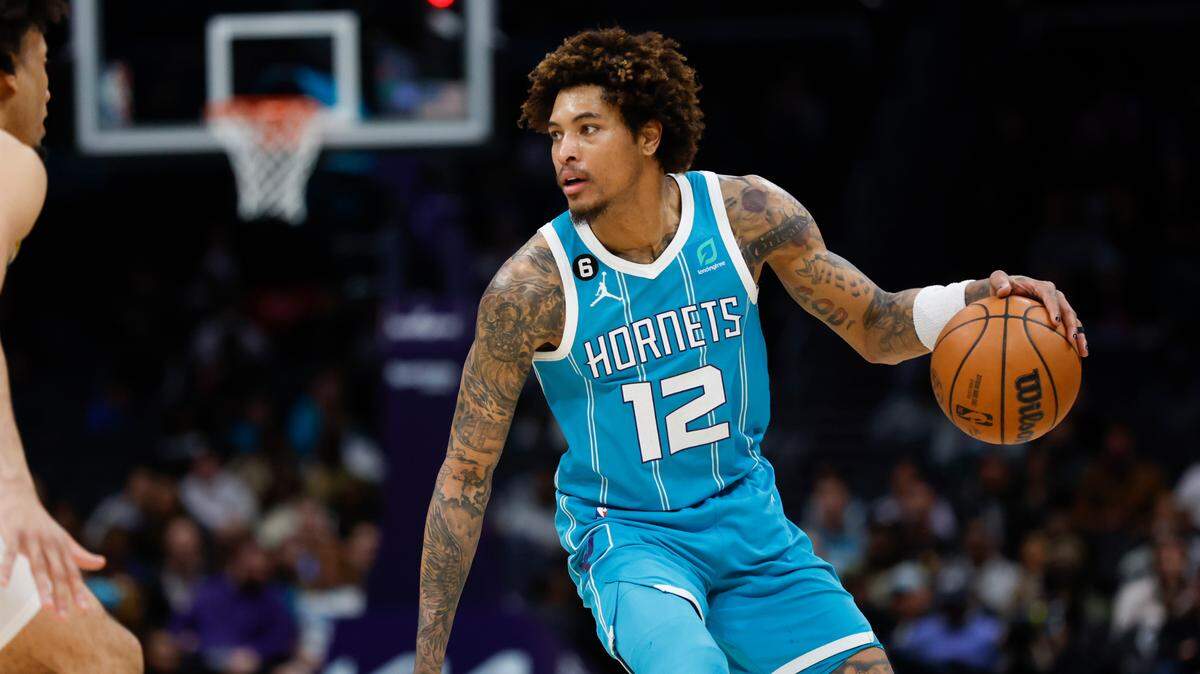 Charlotte Hornets guard Kelly Oubre Jr. (12) dribbles against the Indiana Pacers during the second half at Spectrum Center in Charlotte, North Carolina, on March 20, 2023.