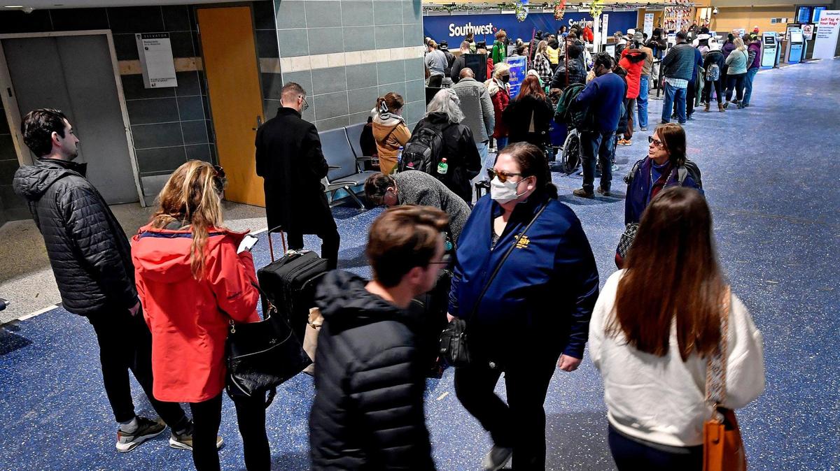 After a nightmarish holiday travel weekend that left thousands stranded across the country, lines had thinned B Terminal at Kansas City International Airport. This group stood in line at the Southwest Airlines ticketing counter Tuesday afternoon.