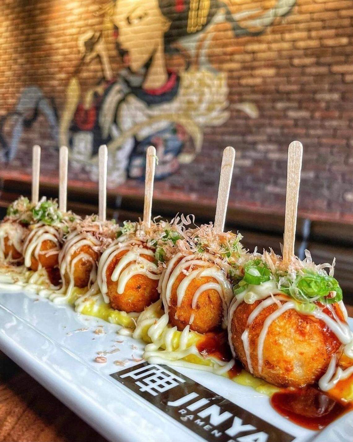 Jinya’s takoyaki: battered octopus over egg tartar topped with Kewpie mayonnaise, okonomiyaki sauce, green onion and smoked bonito flakes.