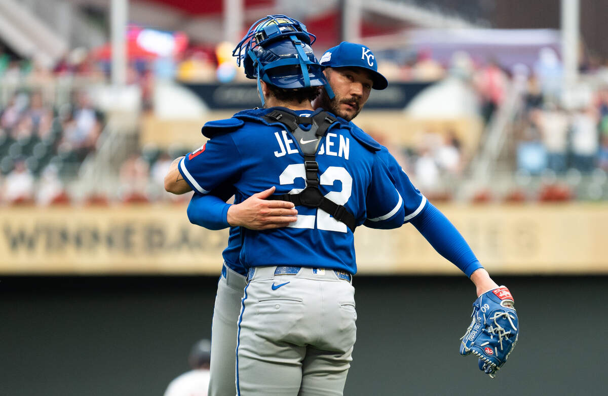 Lucas Erceg #60 of the Kansas City Royals embraces Carter Jensen #22 after the game against the Minnesota Twins at Target Field on June 7, 2026 in Minneapolis, Minnesota.