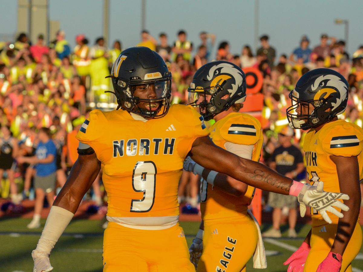 Liberty North’s Melvin Laster gets ready for Friday night’s high school football game against Liberty.