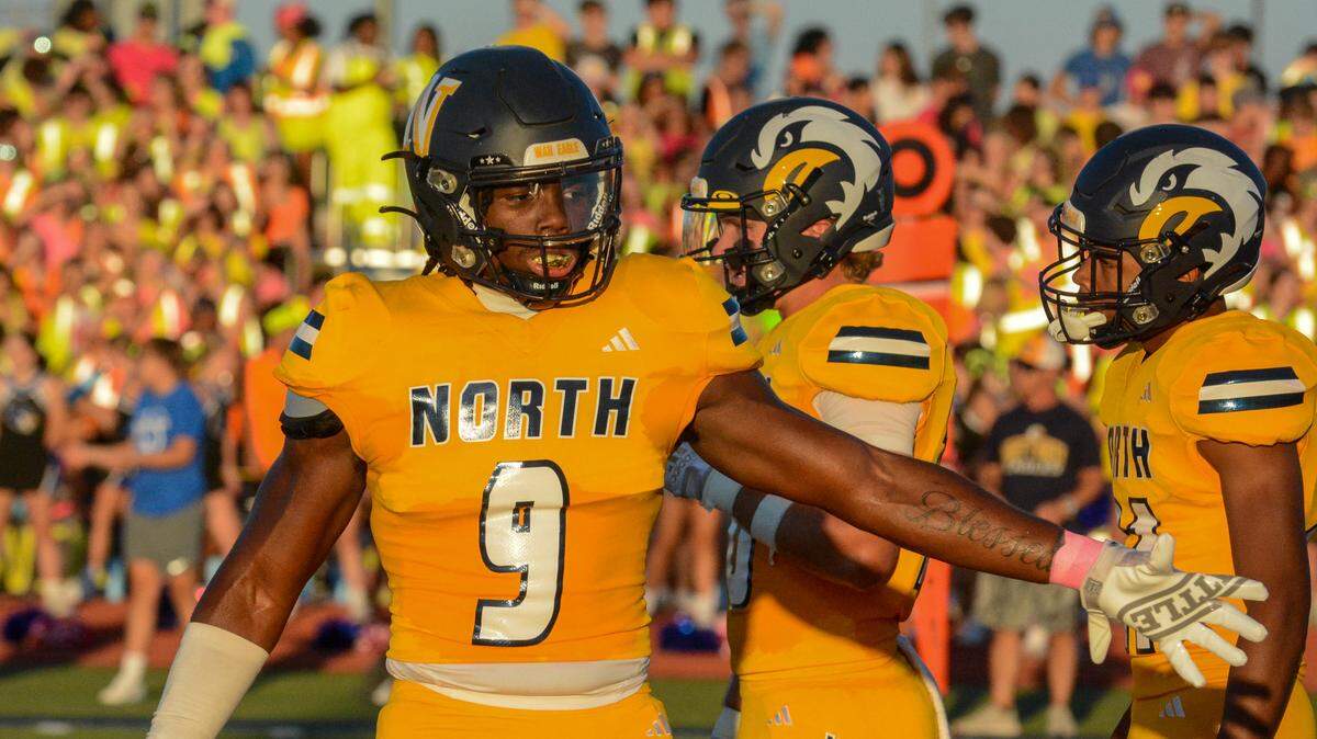 Liberty North’s Melvin Laster gets ready for Friday night’s high school football game against Liberty.