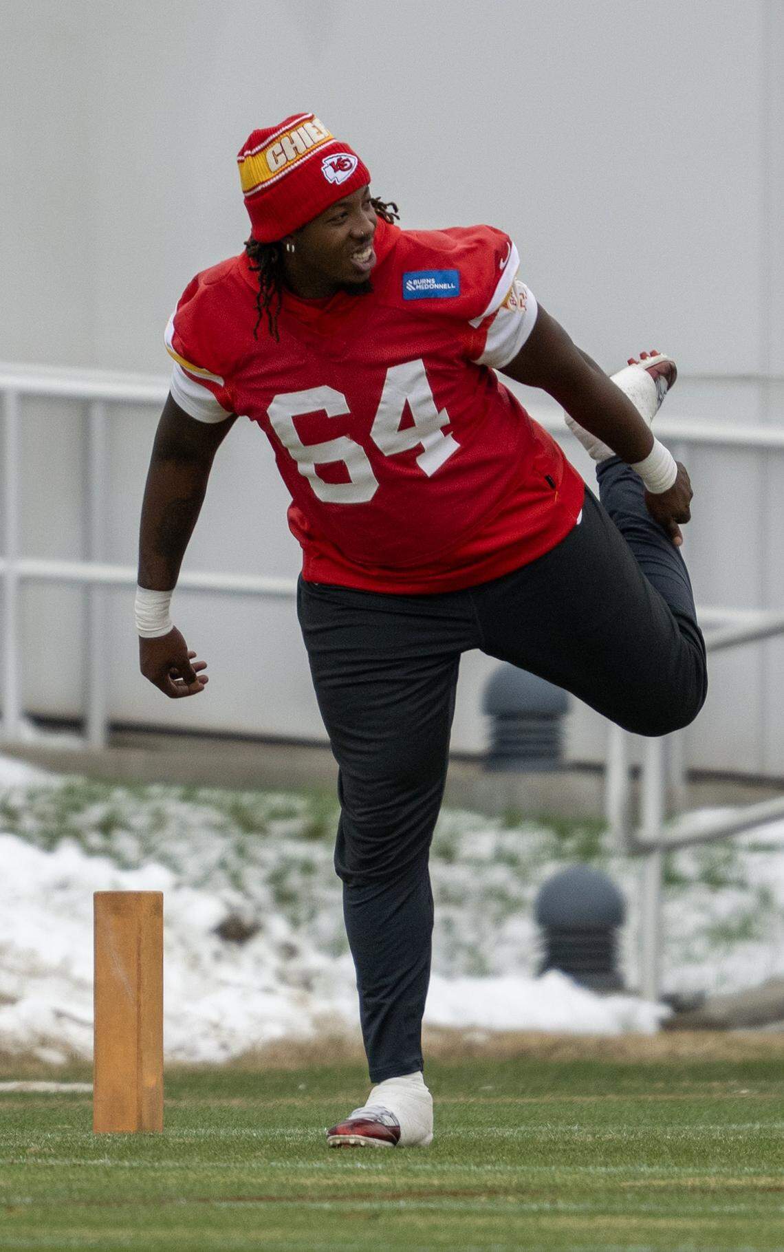 Chiefs tackle Wanya Morris (No. 64) stretches during practice on Wednesday, Dec. 3, 2025, in Kansas City.
