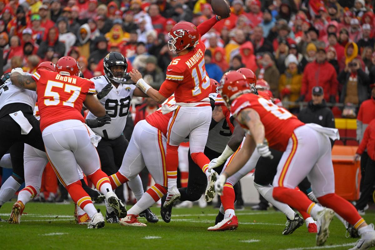 Chiefs quarterback Patrick Mahomes (15) went for a pass during the first half of the Divisional Round of the playoffs on Saturday, Jan. 212023, at GEHA Field at Arrowhead Stadium.Mahomes left the game with an apparent injury.