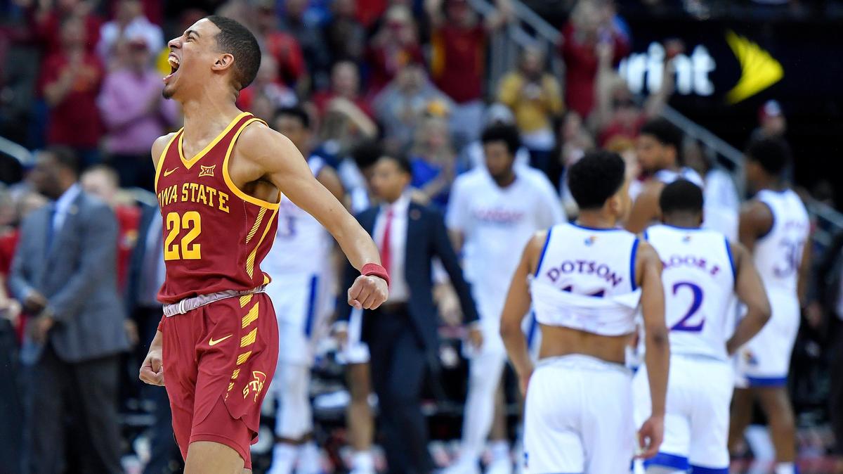 Tyrese Hailburton (22) and the Iowa State Cyclones were over the top while celebrating their 78-66 win over Devon Dotson and the Kansas Jayhawks in the championship game of the Big 12 Tournament Saturday night at the Sprint Center.