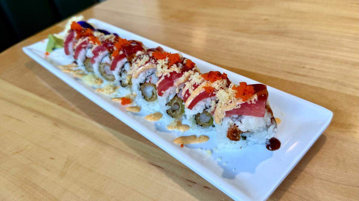 The KC Chiefs Roll (shrimp tempura, crab, avocado, tuna, eel sauce, spicy mango, masago and tempura crunch) is one of several options at Sannin.