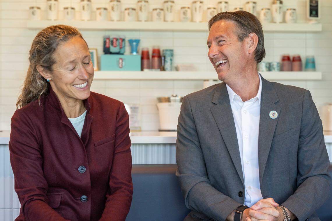 Angie and Chris Long, owners of the Kansas City Current, speaking with the Star's Eric Adler, at CPKC Stadium on Thursday, October 16, 2025, in Kansas City.