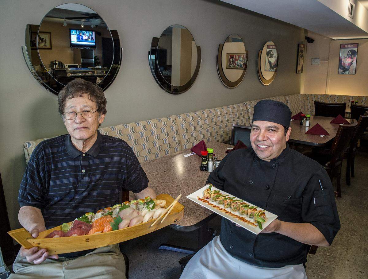 Ted Hamada, left, and Salvador Cerritos opened Kabuki Sushi at 333. W. Meyer Blvd. in 2017 after the original in Crown Center closed in 2014. Hamada died on Dec. 11, at age 71.