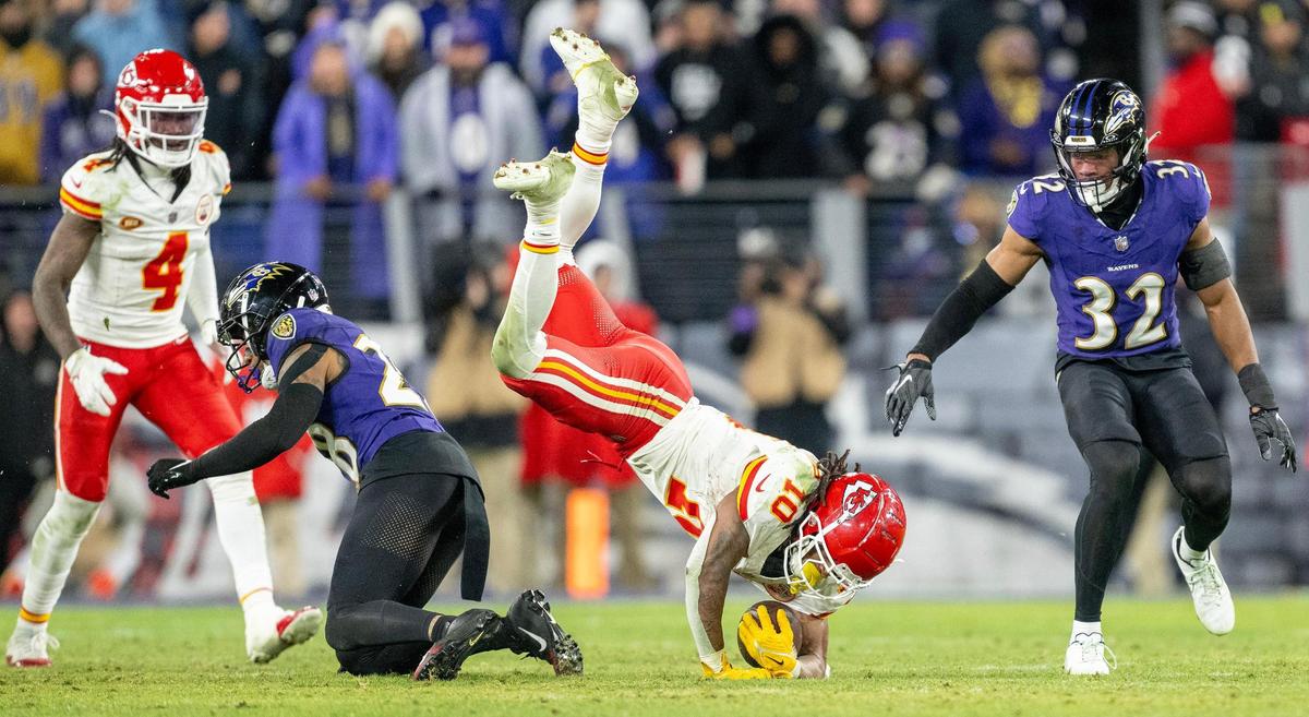 Kansas City Chiefs running back Isiah Pacheco (10) lands on the ground after being upended by Baltimore Ravens cornerback Ronald Darby (28) during the AFC Championship Game on Sunday, Jan. 28, 2024, in Baltimore.