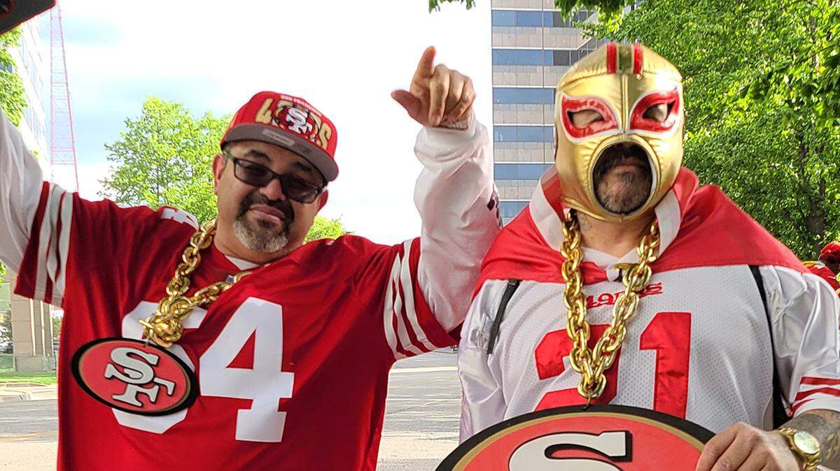 “I didn’t expect it to be this friendly,” said California football fan Rigo Bocanegra, left.