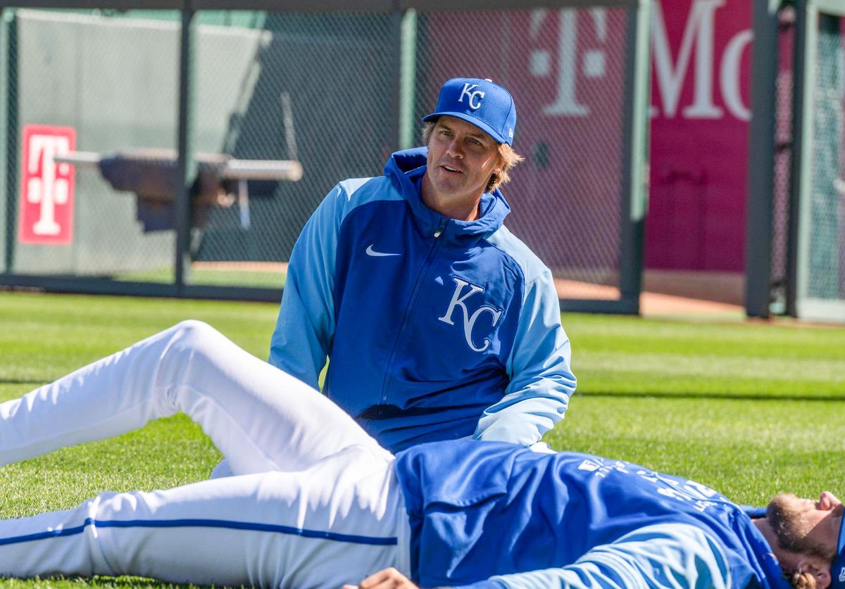 Starting pitcher Zack Greinke stretched in the outfield during the Kansas City Royals’ practice at Kauffman Stadium on Wednesday, April 7, 2022.