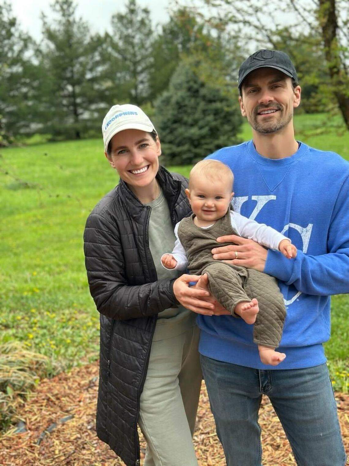 Kate Barker and Andy Sternberg with their baby, Bobbi. The couple own Zen Donkey Farms.