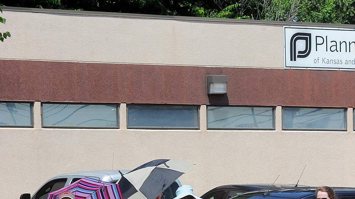 Supporters and opponents of abortion rights demonstrated in July 2015 outside the Planned Parenthood in Columbia. Planned Parenthood organizations that operate in Missouri said Wednesday they will expand abortion services to in midtown Kansas City, Columbia, Joplin and Springfield after a judge halted a state law restricting the practice.