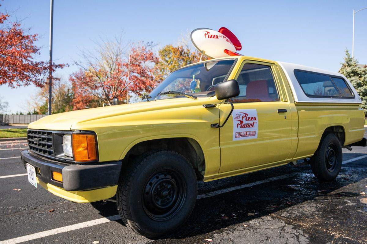 Russell Dameron says finding the Pizza Planet light to put on top of his “Toy Story” movie car was a daunting task.