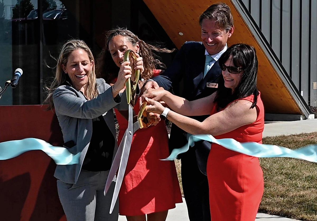 KC Current co-owners Angie and Chris Long (middle) were joined by NWSL commissioner Jessica Berman (left) and Riverside mayor Kathy Rose to officially cut a ribbon signifying the opening of the KC Current’s new training facility.