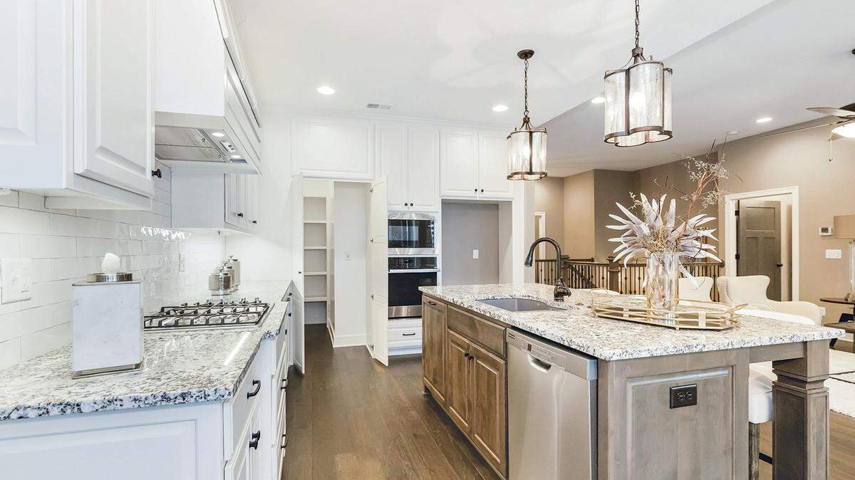 The Willow reverse 1 1/2 story luxury villa in Crestwood Village, built by JFE.