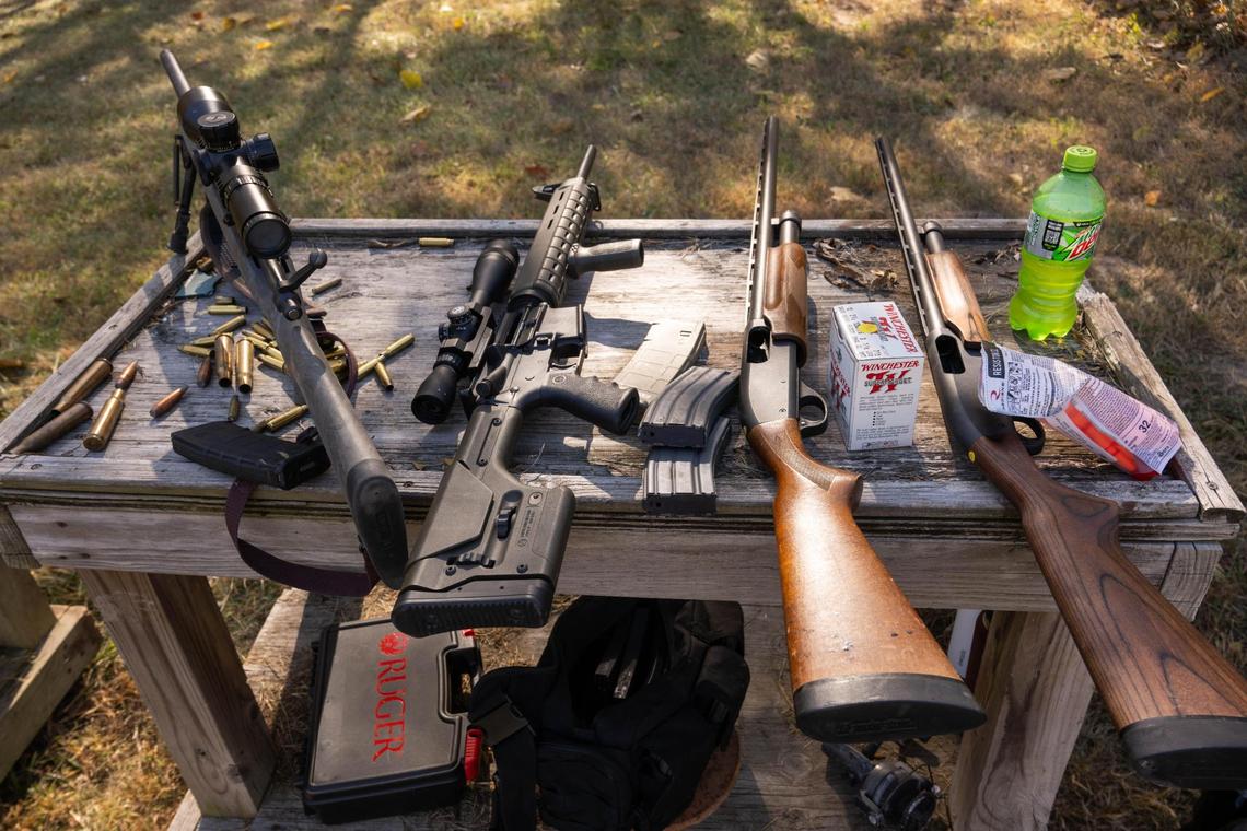 An assortment of firearms are waiting to be fired before a sport shooting campaign event for Democratic candidate for Missouri U.S. Lucas Kunce on Tuesday, Oct. 22, 2024 in Holt, Missouri.