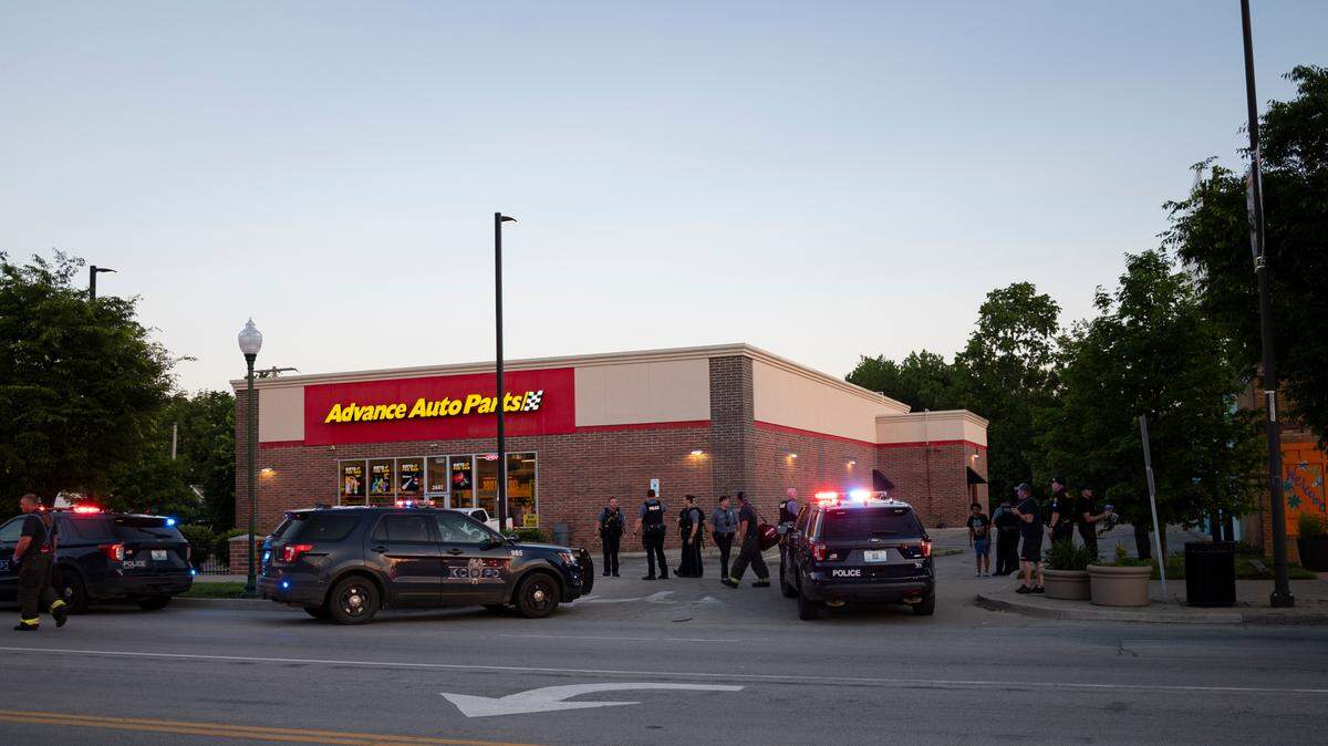 First responders gather and secure the crime scene late in the evening of May 27, 2022, after an officer involved shooting took place in the Independence plaza neighborhood near 6th Street and Prospect Avenue.