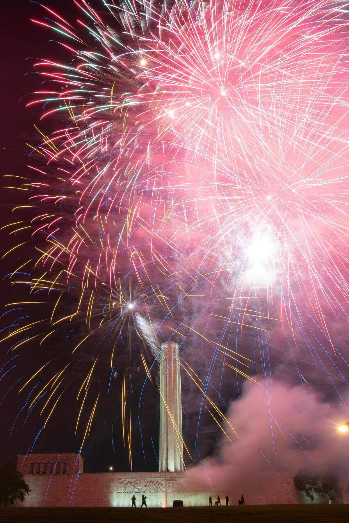 Fireworks light the sky over Liberty Memorial Saturday night during the Stars and Strips Picnic Independence Day celebration at the National WWI Museum and Memorial.