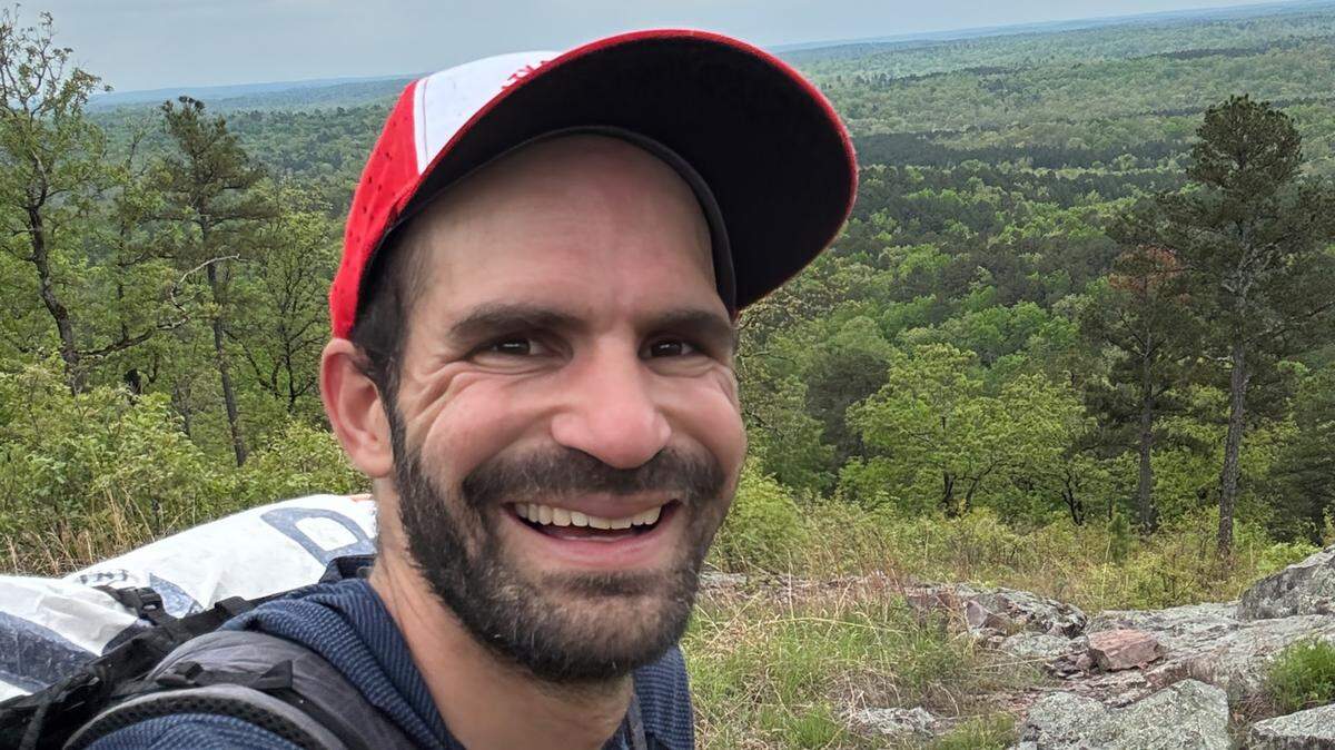 Tim Beissinger, a former University of Missouri professor and one half of the popular @ThruHikers on TikTok, set out on a record-breaking hike along the Ozark Trail this month.