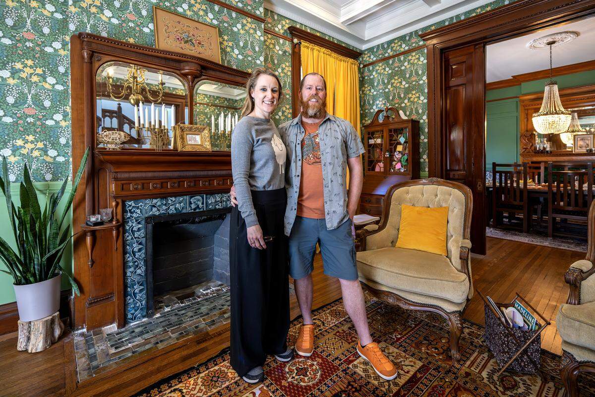 Bethany, left and Ben Bezanson stand for a portrait at their home on Wednesday, April 8, 2026, in Kansas City.