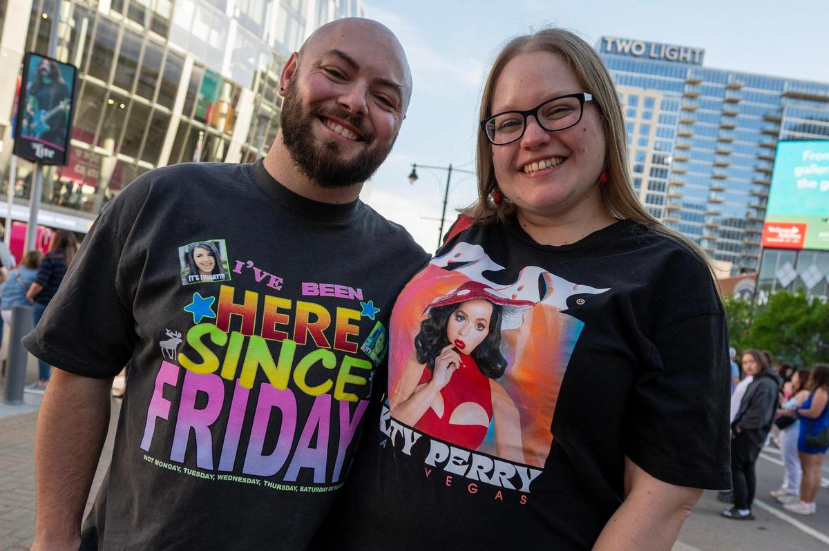 Patrick Cox, left, and Chelsea Musfeldt pose for a portrait while waiting in line to see Katy Perry’s Lifetimes Tour at the T-Mobile Center on Saturday, May 10, in Kansas City.