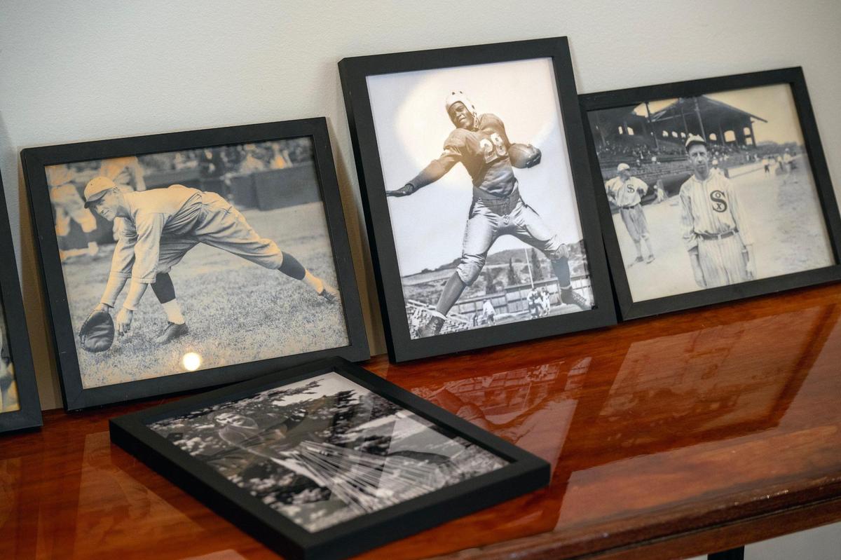 Vintage sports photographs are on display at Le Champion, 4149 Pennsylvania Ave.