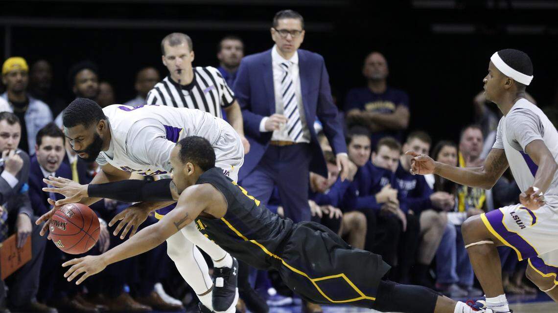 Craig Doty (top), who led Graceland to the NAIA Division I championship, is taking over as basketball coach at Emporia State.