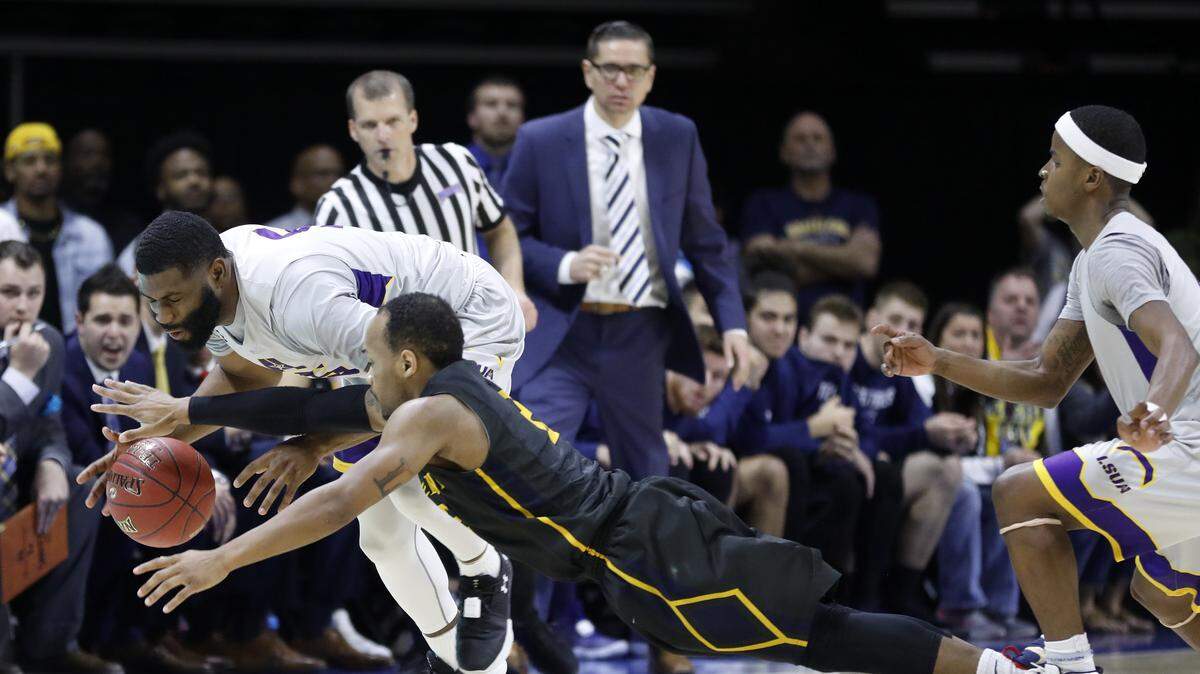 Craig Doty (top), who led Graceland to the NAIA Division I championship, is taking over as basketball coach at Emporia State.