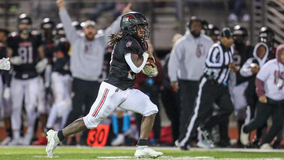 Lee’s Summit North’s Quincey Baker races downfield for a 40 yard gain during second quarter action of the game with Raymore-Peculiar on November 5, 2021, in Lee’s Summit, MO.