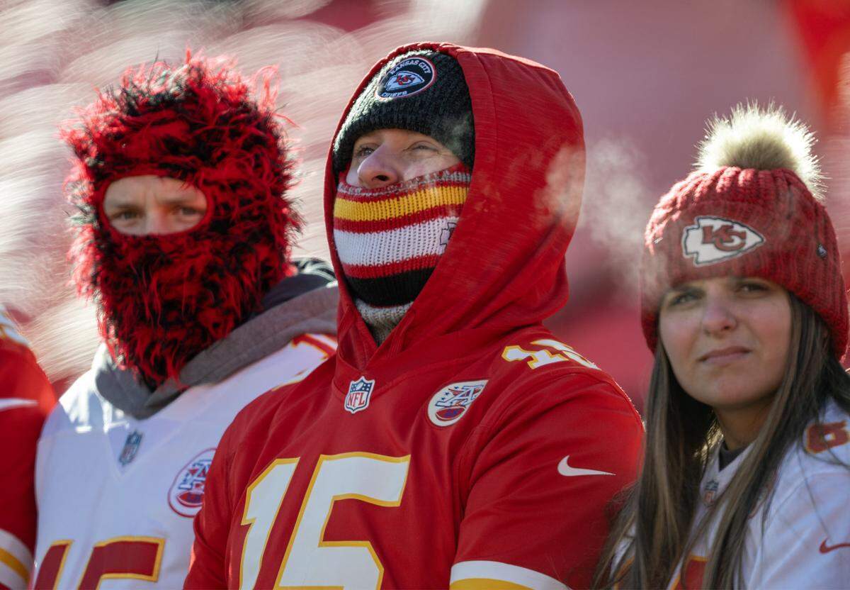 Chiefs fans braved the cold to watch the warmups before the game against the Los Angeles Chargers on Sunday, Dec. 14, 2025 at GEHA Field at Arrowhead Stadium in Kansas City.