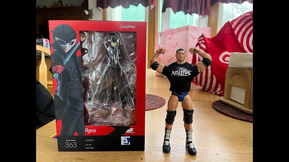 Kansas City Star reporter Joseph Hernandez bought three items at Planet Comicon Kansas City, and pictured are two: a Max Factory Figma action figure of Joker from the video game “Persona 5,” and a Mattel Ultimate Edition Batista action figure from WWE.