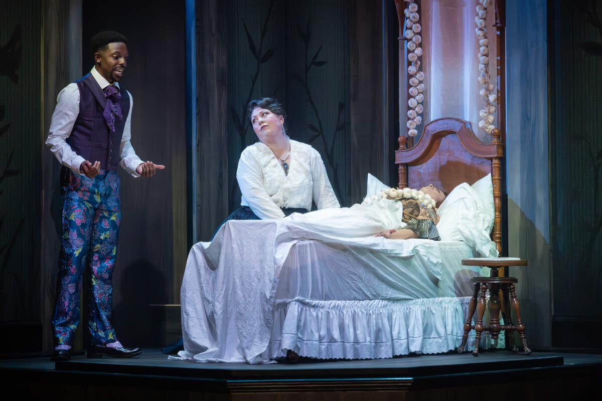 Donovan Woods as Arthur, Shanna Jones as Mrs. Westerna, and Elaine Elizabeth Clifford as Lucy in a scene from “Dracula,” as Lucy’s condition worsens.