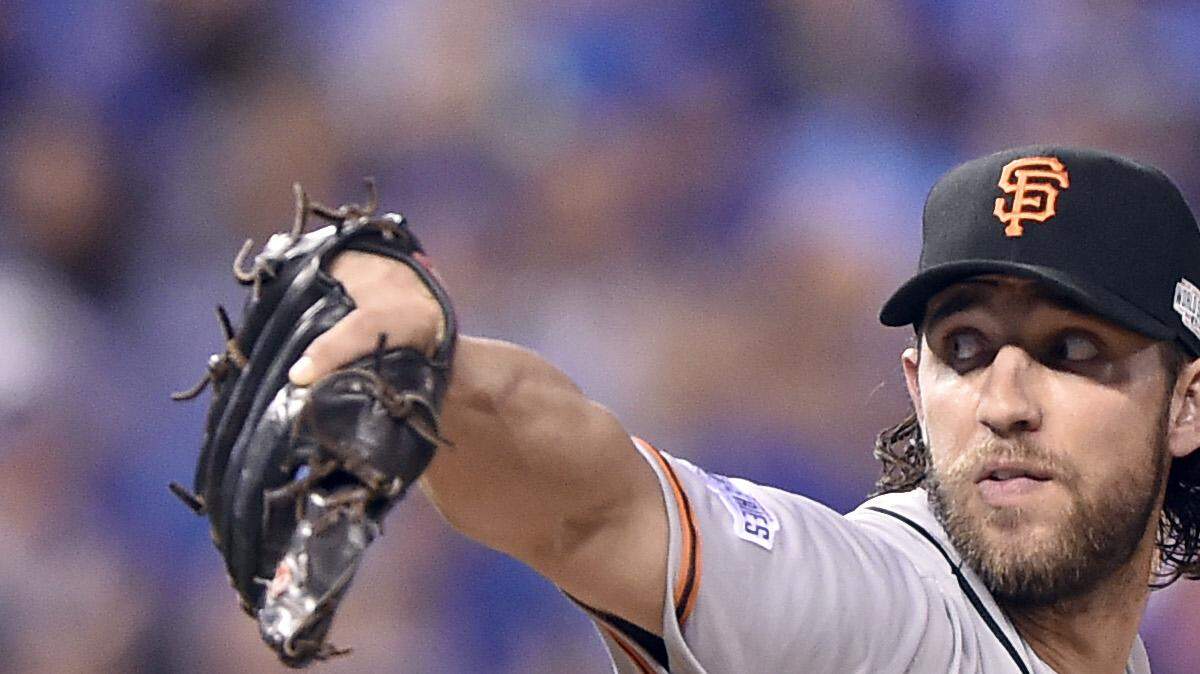 San Francisco Giants pitcher Madison Bumgarner threw in relief in the fifth inning  in game seven of the World Series on Wednesday, October 29, 2014, at Kauffman Stadium in Kansas City, Mo.