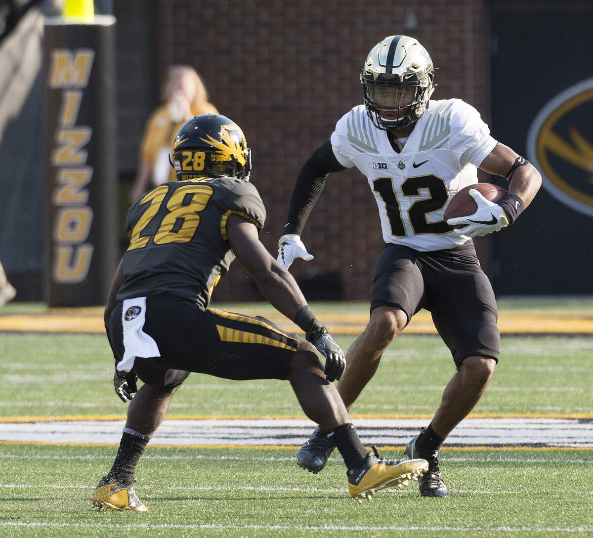 Purdue’s Jared Sparks, right, tries to run past Missouri’s Logan Cheadle during the second quarter of an NCAA college football game Saturday, Sept. 16, 2017, in Columbia, Mo. (AP Photo/L.G. Patterson)