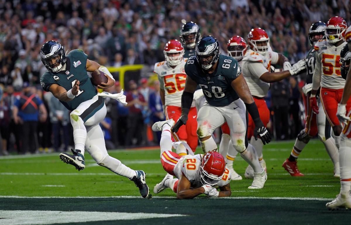 Philadelphia Eagles quarterback Jalen Hurts (1) went in for touchdown during the first half of Super Bowl LVII between the Kansas City Chiefs and the Philadelphia Eagles on Sunday, Feb. 12, 2023, at State Farm Stadium in Glendale, Arizona.