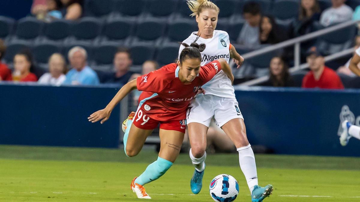 KC Current Midfielder Victoria Pickett (99) attempts to edge around Gotham FC midfielder McCall Zerboni (7) during the game between the KC Current and Gotham FC on Saturday June 11, 2022 at Children’s Mercy Park in Kansas City, Kansas.